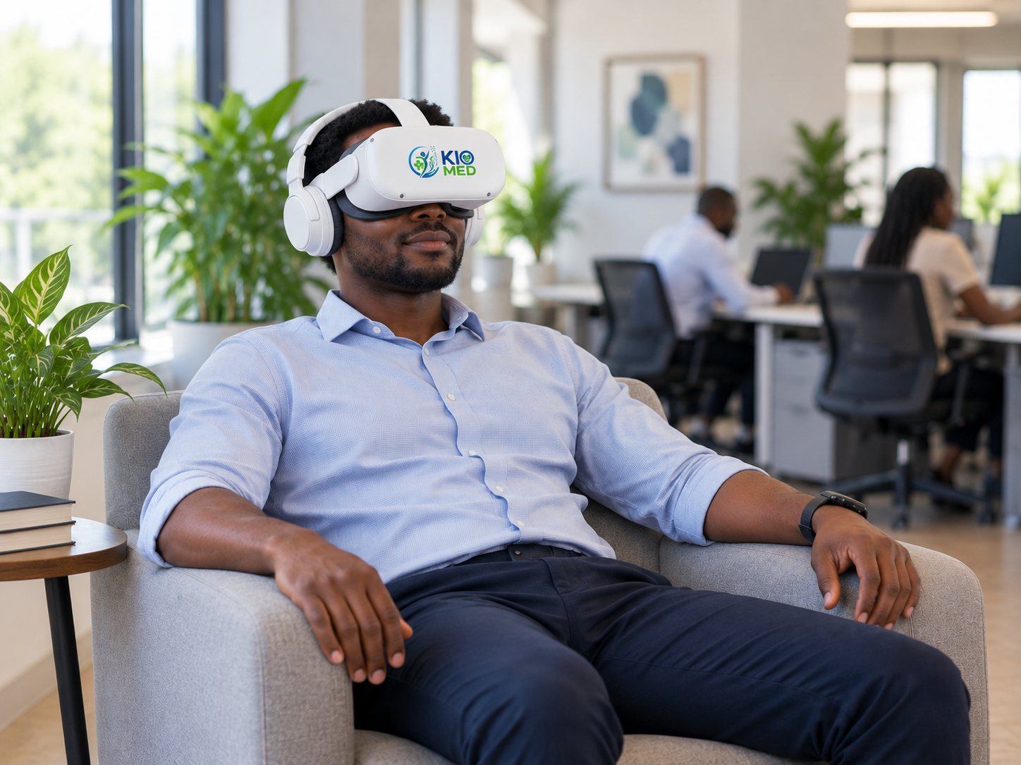 An office worker relaxes in an armchair wearing a VR headset and headphones in a quiet corner of the office